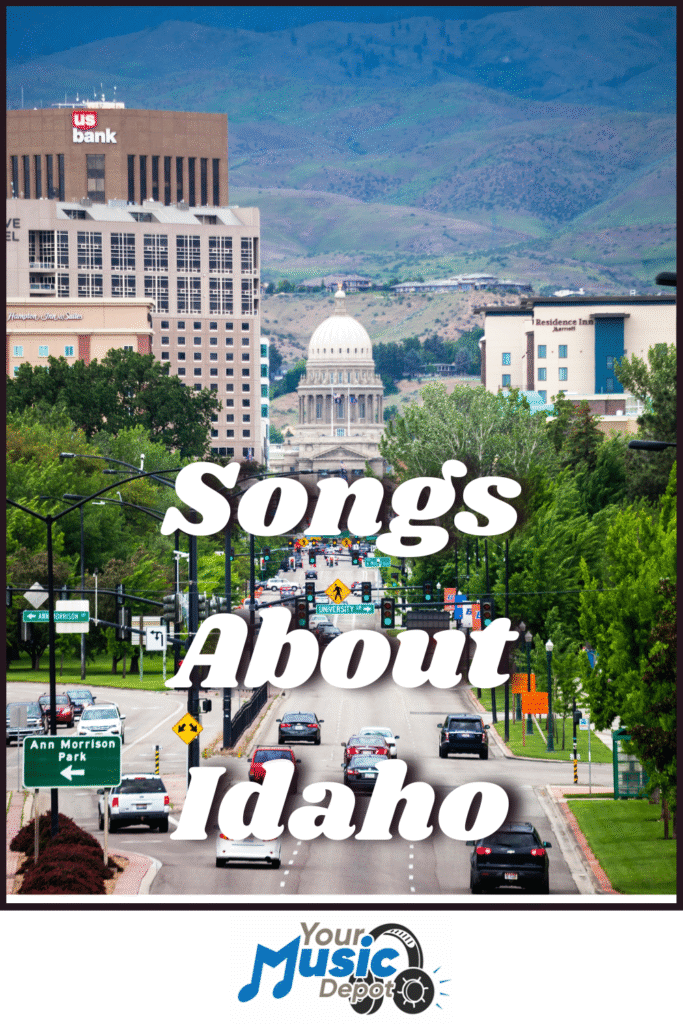 A city street in Idaho with cars, trees, and distant mountains; the Idaho State Capitol building is centered. Text reads: “Songs About Idaho” and “Your Music Depot,” highlighting Idaho folk songs.
